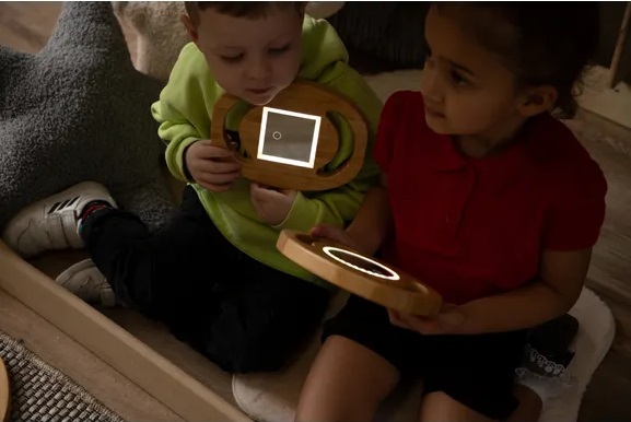 Children in the dark reading