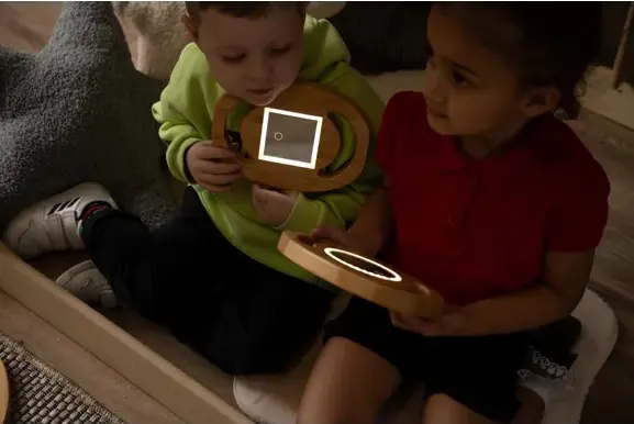 Children in the dark reading